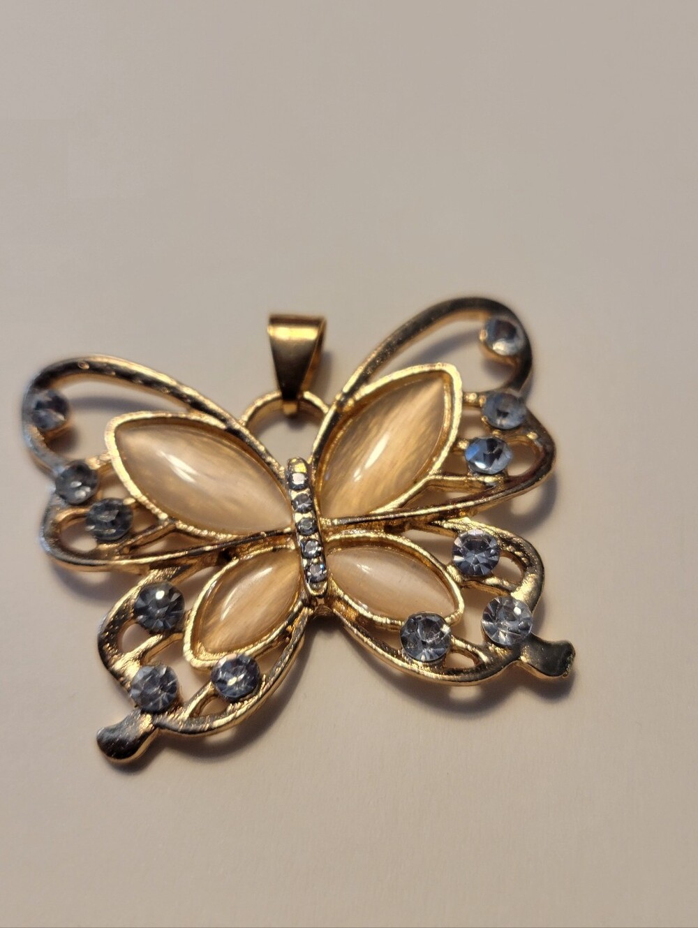 Gold Butterfly Pendant Necklace with Cream and Light Blue Accents